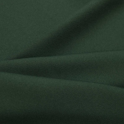 Ткань костюмная 21010 2076, 225 гр/м2, шир.150см, цвет т.зеленый - купить в Стерлитамаке. Цена 390.73 руб.